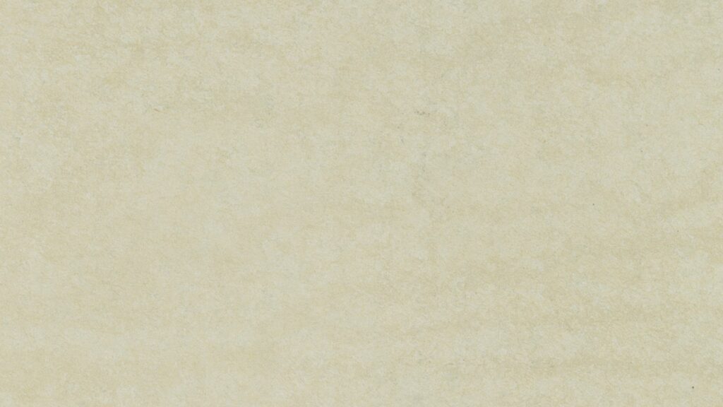 A close-up image of a light beige textured surface. The texture appears subtle with slight variations in color, giving it a gentle, mottled look. The overall effect is a soft, neutral background.